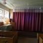 Christian symbols are hidden behind a curtain in this VA chapel.