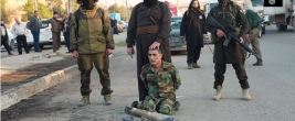 ISIS butchers cut off the head of this Kurdish soldier shortly after this photo was taken.
