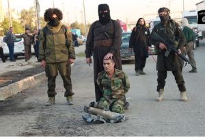 ISIS butchers cut off the head of this Kurdish soldier shortly after this photo was taken.