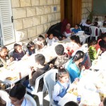 In this area of southern Lebanon near the Mediterranean Sea it was still warm enough for the children to eat outdoors.