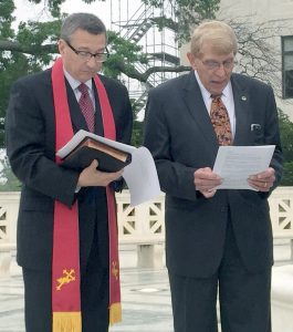 Rev. Rob Schenck and William Murray pray at the Supreme Court on the National Day of Prayer