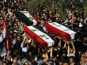 Funeral procession in Syria for Christians killed by Islamists on September 10, 2013.