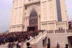 Thousands of Chinese Christians have mounted an extraordinary defence of a church in a city known as the 'Jerusalem of the East'
