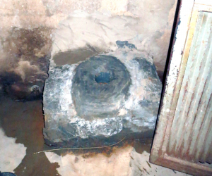 This is the squatting toilet in a girls’ group house. The boys’ toilets are further away from the water tank. Proper flushing to the septic tank is needed.
