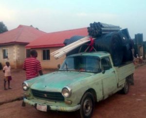 A small truck arrives with parts for new water system being supplied by the Religious Freedom Coalition.